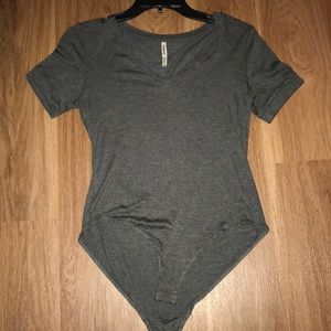 Grey one piece shirt.